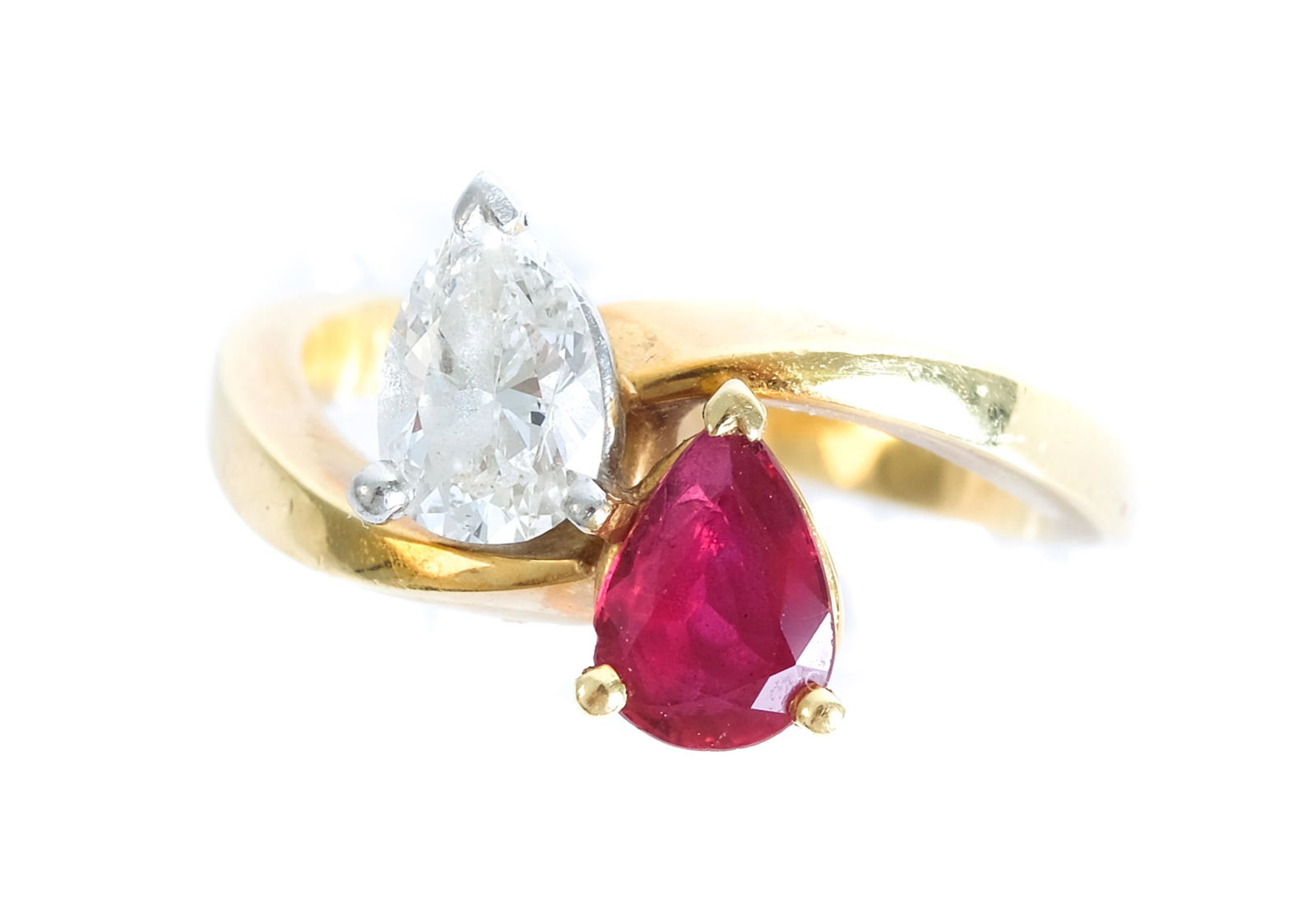 18K YG Kurt Wayne Ruby & Diamond By Pass Ring: Attributed to Kurt Wayne. 18K yellow gold with platinum diamond head ruby and diamond 'by-pass' ring having single pear shaped ruby (7.0 x 5.03 x 2.73mm, 0.76 ct, medium dark red color range, eye clea