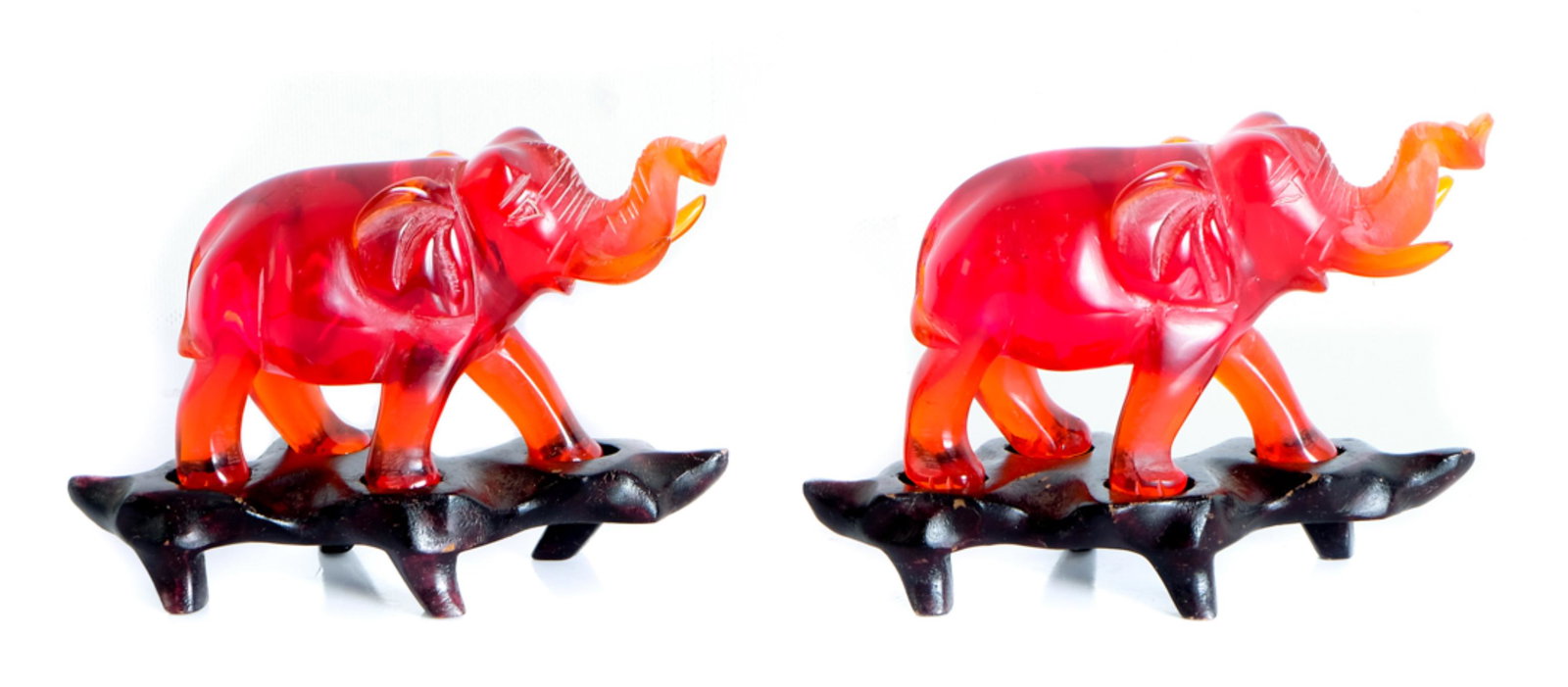 Pair, Vintage Bakelite Figures of Elephants: Pair of vintage bakelite elephants presented on fitted wood stands. Approx. height 3.5" (on stands), stands 5" x 2". Provenance: From the Collection of a prominent dignitary from Atlanta, Georgia.