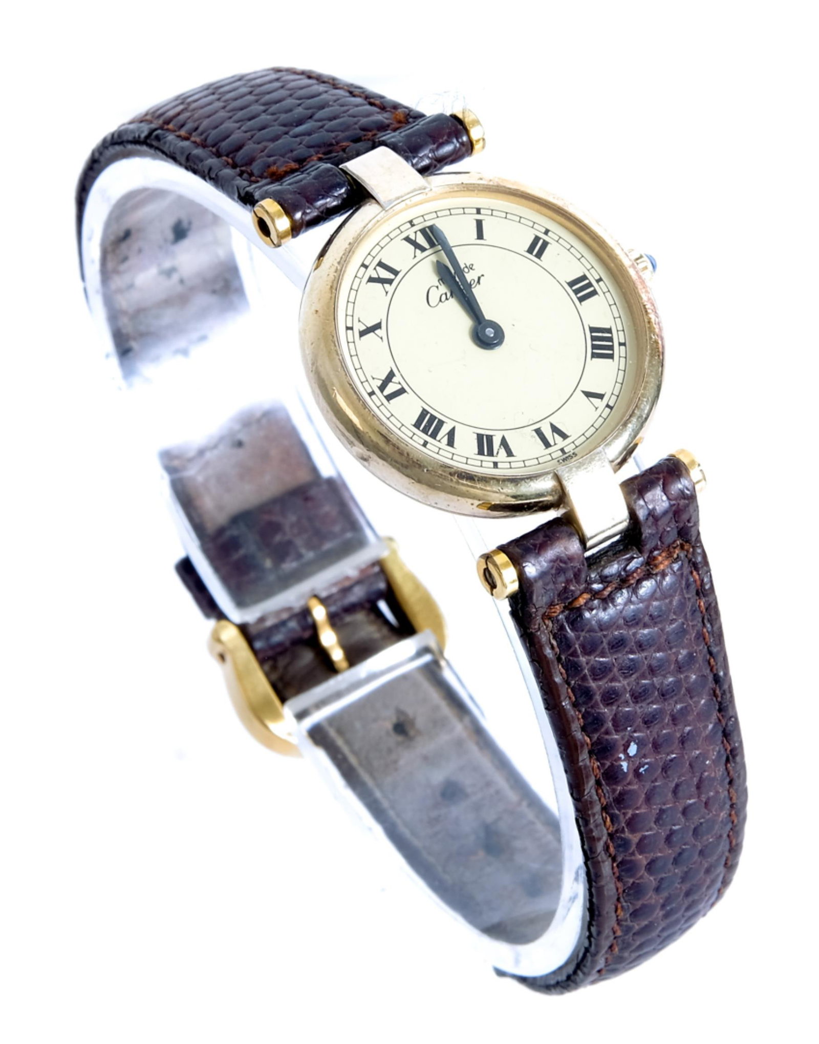 Must de Cartier 925 Sterling Vermeil Watch: Must de Cartier Sterling with vermeil watch with crown blue sapphire, Roman numerals, quartz movement, with brown leather strap.
