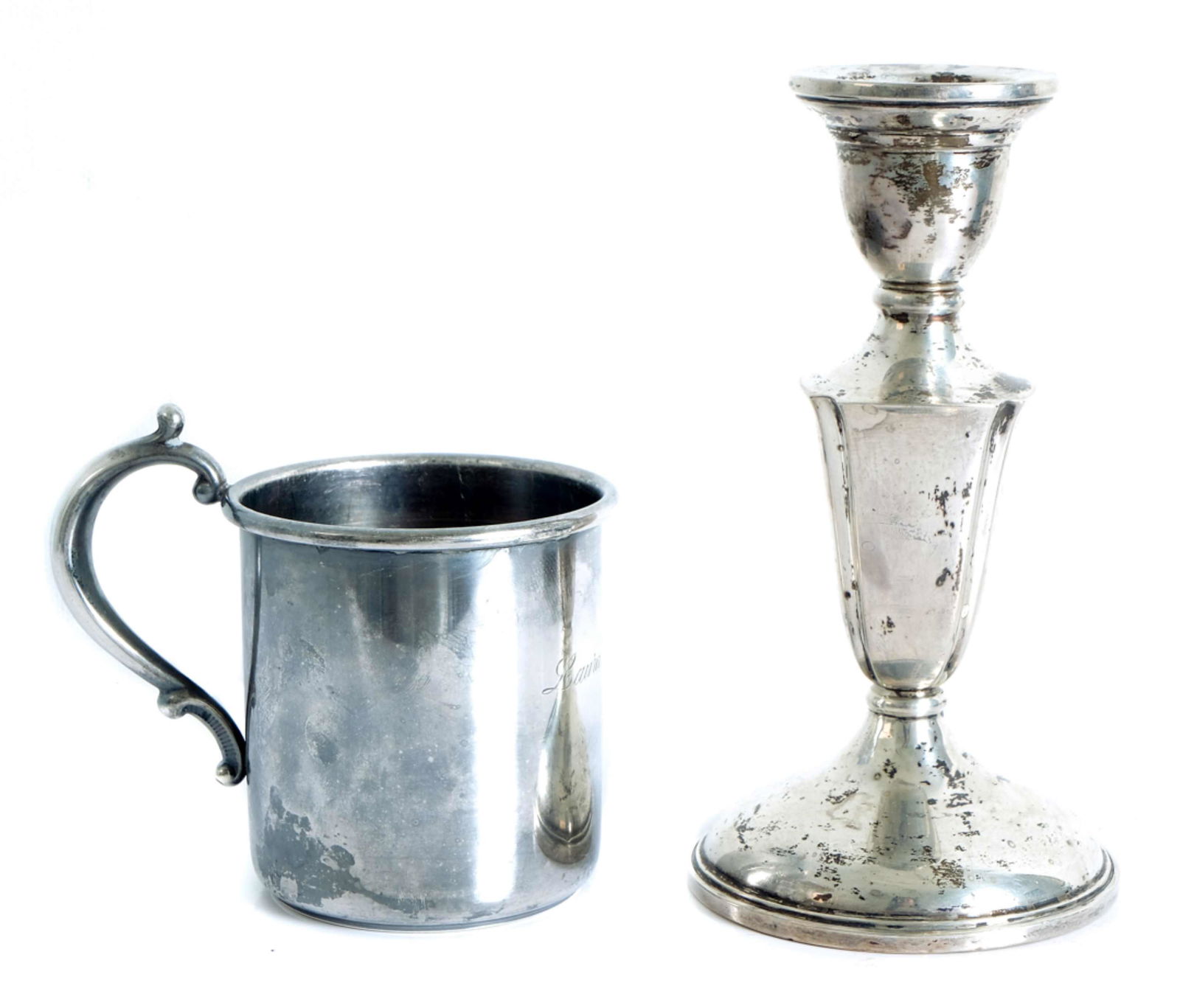 Two Sterling Silver Table Accessories: Two sterling silver table accessories comprising 5.5" Elgin weighted candlestick and Mueck-Carey Co. sterling silver handled baby cup inscribed Laura Marshall. Cup Hallmarked underside for Mueck-Carey
