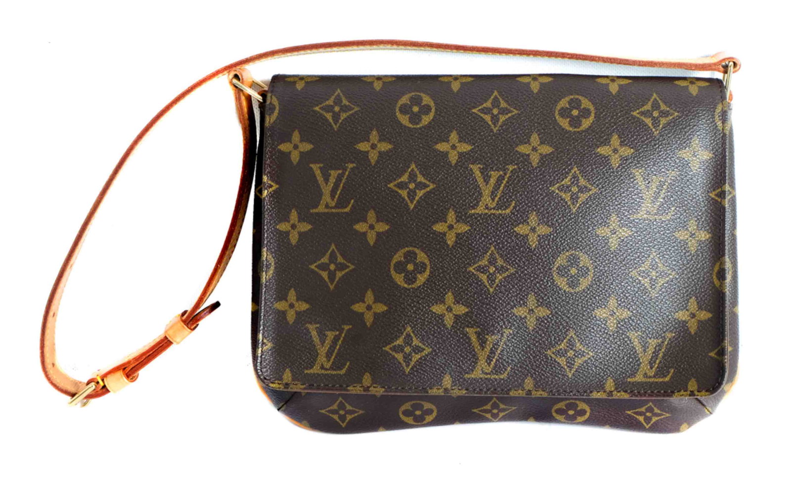 Louis Vuitton Monogram Musette Tango: This chic shoulder bag is crafted of monogram toile canvas and features an adjustable vachetta leather shoulder strap with brass hardware. The flap opens to an orange microfiber interior with a patch