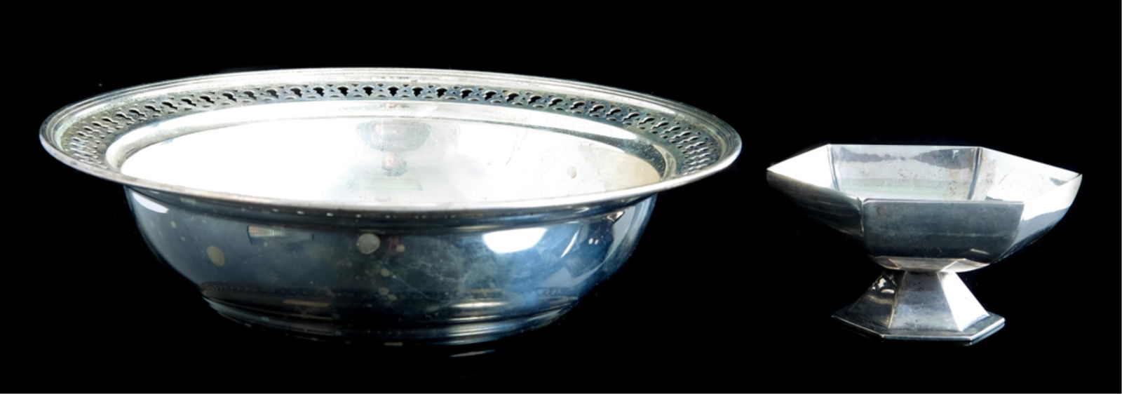 Two Tiffany & Co Sterling Silver Table Accessories: Tiffany & Company (American, 1837), two sterling silver table accessories comprising a reticulated bowl, monogrammed. Marked on underside for 1907-1947 directorship of John C. Moore II, 18187C Makers