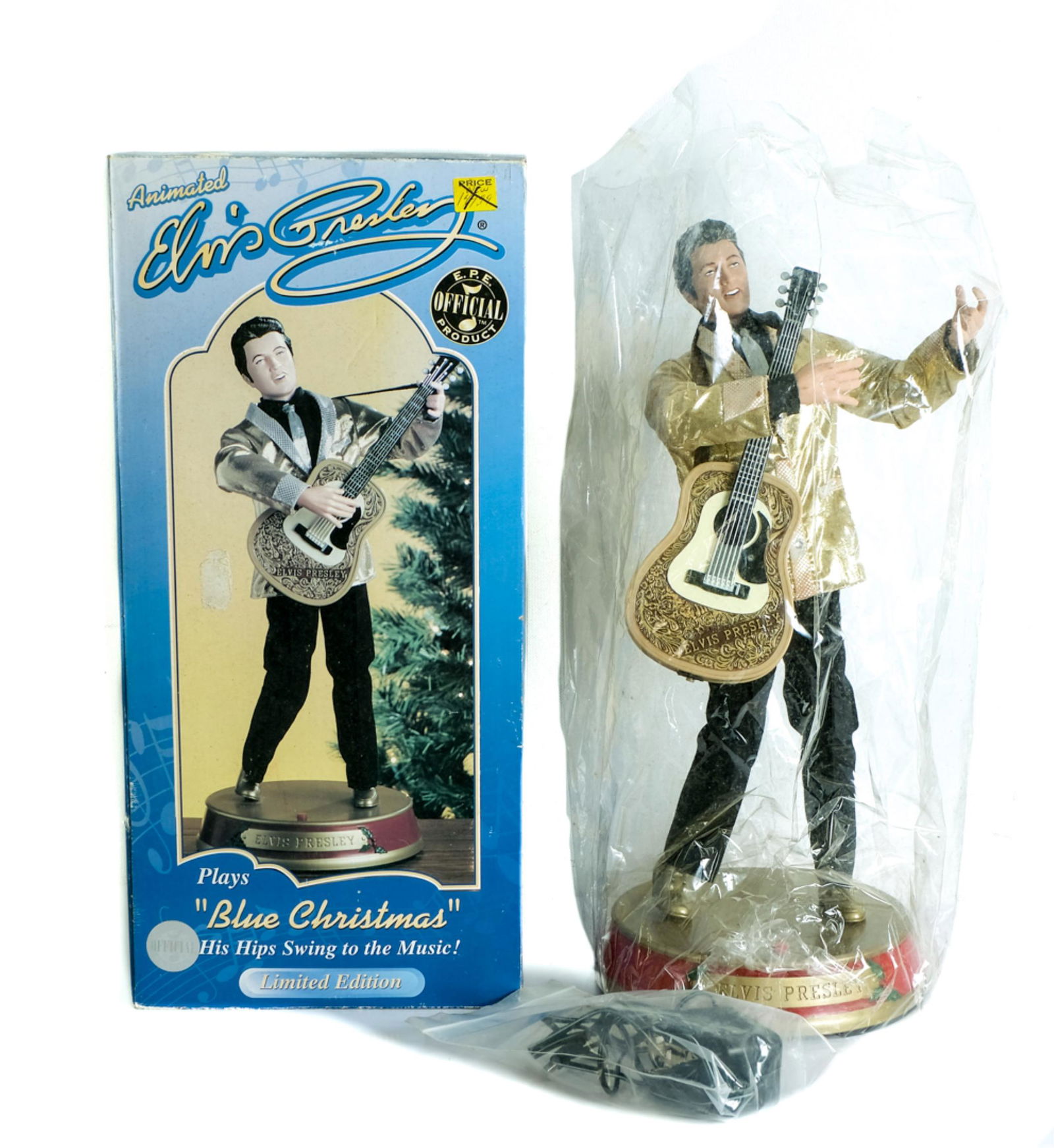 Animated Elvis Presley Doll Plays Blue Christmas: Animated Elvis Presley limited edition doll plays 'Blue Christmas' while his hips swing to the music. In the original box - lacking packaging. Approx. height 19 inches.