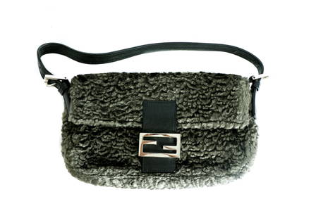 Fendi Grey Curly Lamb Baguette Bag: Fendi grey curly lamb wool baguette bag with palladium tone hardware and black leather strap. Interior is velvet and black lambskin leather. A magnetic clasp holds the flap shut. Measures 10 inches wi