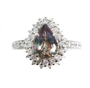 14k WG 1.73 Alexandrite & 0.62ctw Diamond Ring: 14k white gold ring set with a1.73 pear shaped Alexandrite and 0.62ctw white diamond accents. Ring size 7. Hallmarked 14k SD. Lab report #2211624598. Approx. overall weight 4 grams.
