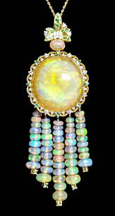 18K YG 97.64ct Opal, Diamond & Tsavorite Necklace: 18k yellow gold necklace hung with 97.64 round Opal and 1.61ctw round white diamonds and Tsavorite. Approx. chain length 18 in., pendant 3.87 in., overall weight 38.6 grams.