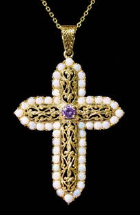18k YG & Opal Filigree Cross Pendant Necklace: 18k yellow gold filigree cross pendant necklace, the cross with approx. fifty opal cabochon stones centered by a round brilliant cut amethyst hung from a 16 inch 14k yellow gold chain. Pendant 