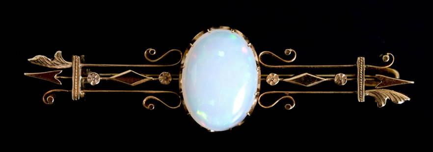 Art Deco 14k Rose Gold Opal Pin Brooch: Art Deco 14k rose gold pin or brooch set with a 5.44ct cabochon opal (approx. 16.5 x 12.8 mm). Not stamped but tested for purity. Approx. length 2.5", weight 9.9 grams.