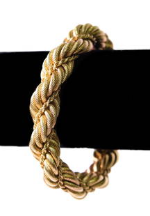 Vintage Tiffany & CO 18k YG Double Rope Bracelet: Vintage Tiffany & Co 18k yellow gold double rope style bracelet. Stamped "Tiffany & Co.", "Italy", "750". Approx. length 7.5 in., overall weight 51 grams.