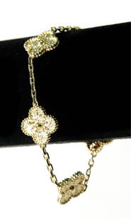 Manner of Van Cleef 18k Yellow Gold 5 Motif Bracelet: Manner of Van Cleef and Arpels, 18K yellow gold Alhambra 5 motif bracelet. Stamped OR VCA AU750/JE697403. Approx. overall length 6.5 inches. Approx. overall weight 16.5 grams. Note: This is an