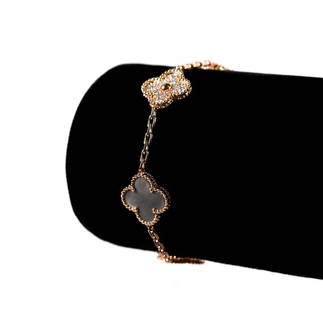 Manner of Van Cleef 18k RG Alhambra Diamond MOP Bracelet: Manner of Van Cleef and Arpels, 18K rose gold Magic Alhambra 5 Motif mother-of-pearl bracelet with diamonds. Stamped VCA AU750/JA570602 and clasp stamped VCA S583. Approx. length 6.75 inches. 