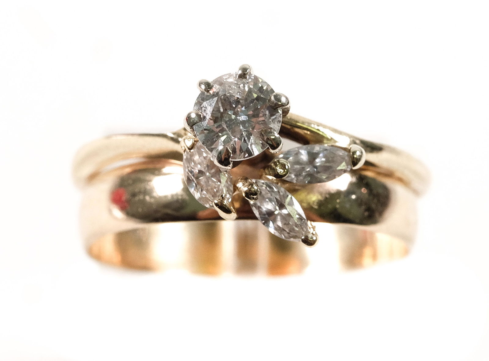14k Yellow Gold & Diamond Floral Ring Size 8 1/2: 14k yellow gold floral ring set with round brilliant cut diamond (approx. 0.4ct) with three marquise diamonds. Ring size 8 Î©. Stamped PMS 14k. Approx. overall weight 3.7 grams.