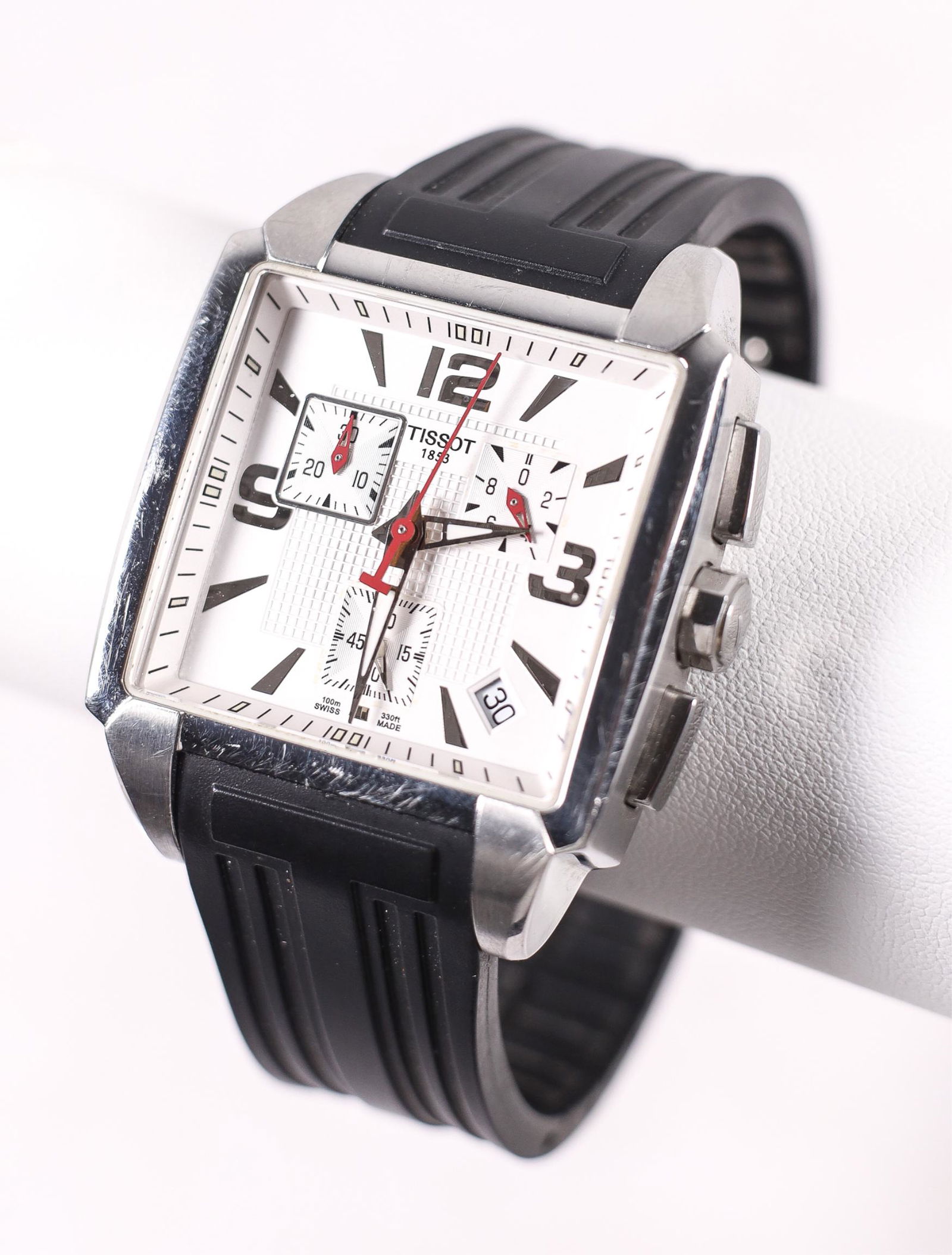 TISSOT T-TREND QUADRATO MEN'S WATCH: Tissot T-Trend Quadrato Men's Dress Style Watch with stainless steel case. Silver dial with luminous silver tone hands and markers. Case Diameter: 40mm x 36mm. Case Thickness:12mm. Scratch Resistant S