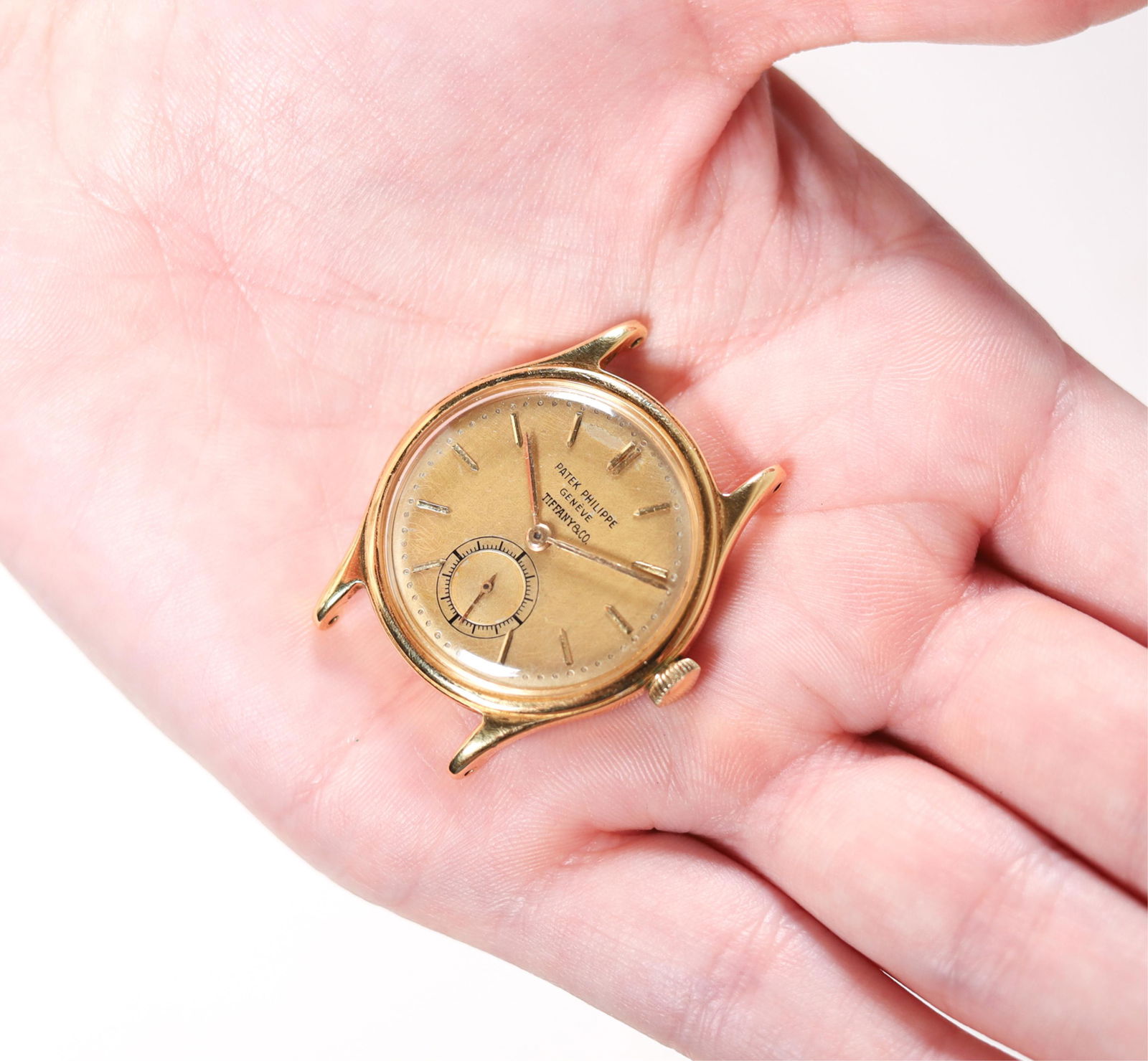 18Y Patek Philippe and Tiffany & Co Calatrava Head: 18Y Patek Philippe and Tiffany & Co Calatrava watch head . 30mm case, 16mm lugs. Stamped on back "MRF 1950" "18k". Weighs 26.4 grams.