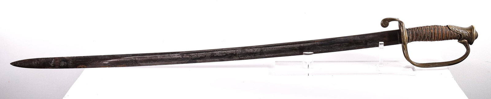 Unmarked Cavalry Sabre, Scrolling Foliate Blade: Unmarked Cavalry Sabre, Scrolling Foliate Blade Etchings. D Hilt with snakeskin and chain handle. In good condition. Overall length: 36 inches. Blade measures 30 inches. Handle measures 6 inches.