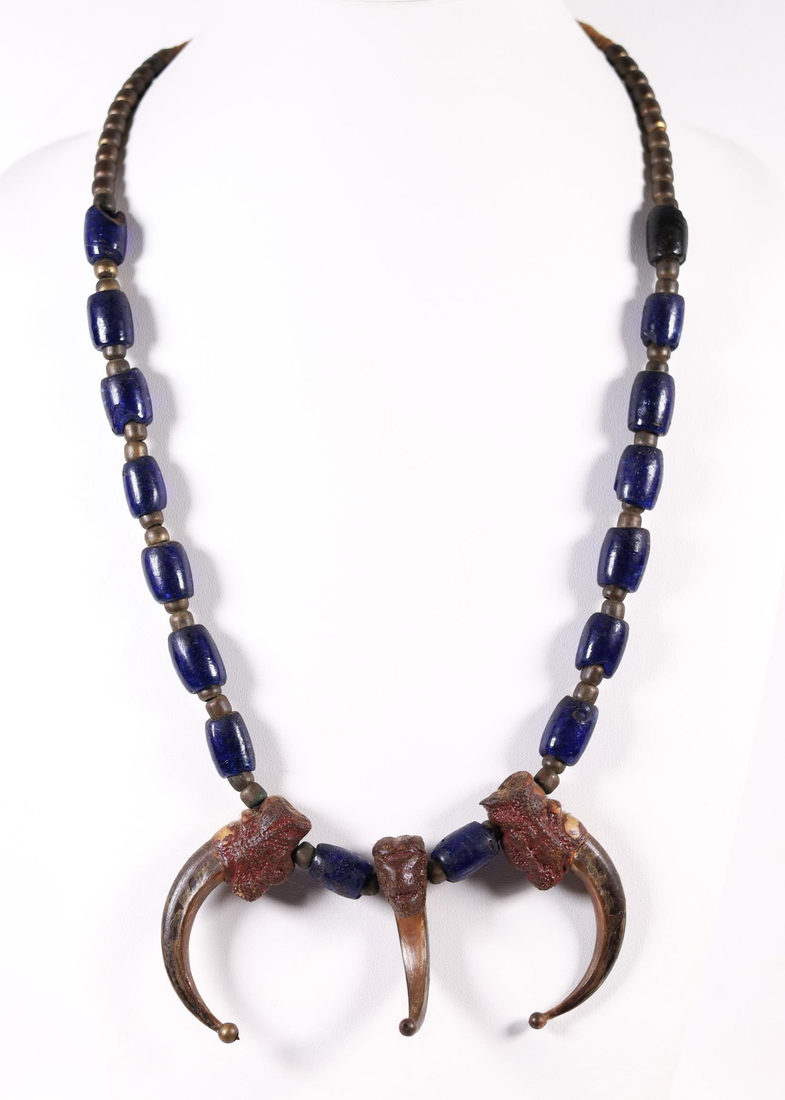 CANADIAN RUSSIAN COBALT BEADS AND TALON NECKLACE: These beautiful hand faceted tubular glass beads originally traded by the Russians to the Alaska indigenous in exchange for sea otter pelts or anything they desired were a desirable currency of their 
