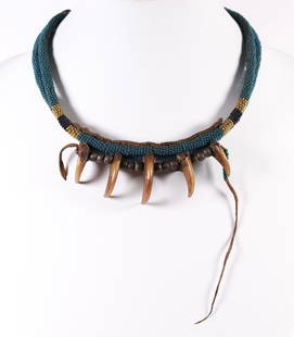 PLAINS TRADING BEAD AND TALON CHOKER: Hubbell beads were glass imported from Italy and Bohemia as a form of trade currency between trading posts and the indigenous people the Plains area. Though there is no significant evidence that the