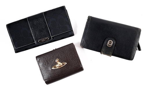 BVLGARI, VIVIENNE WESTWOOD, AND COACH WALLET LOT: Presenting a lot of 3 designer wallets, including one (1) Vivienne Westwood leather small frame wallet, one (1) Coach signature canvas wallet, and one (1) Bvlgari black leather wallet. In varying cond