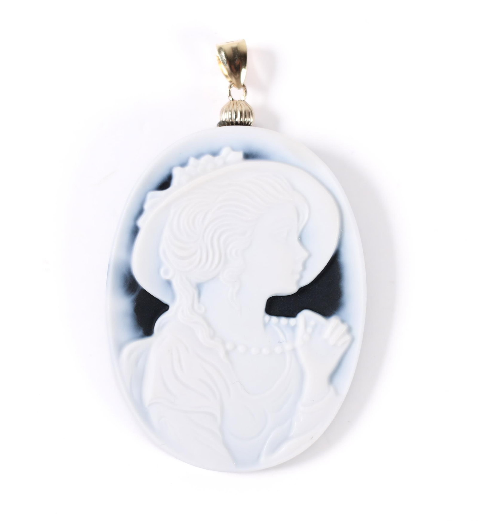 18KYG BLUE AGATE CAMEO PENDANT: Handmade 18K yellow gold blue agate cameo pendant having a portrait of a girl with a hat and dress. Details and measurements: Length (including bail): 2 IN. Width: approx. 1.2 IN. Weight: 7.0 G.