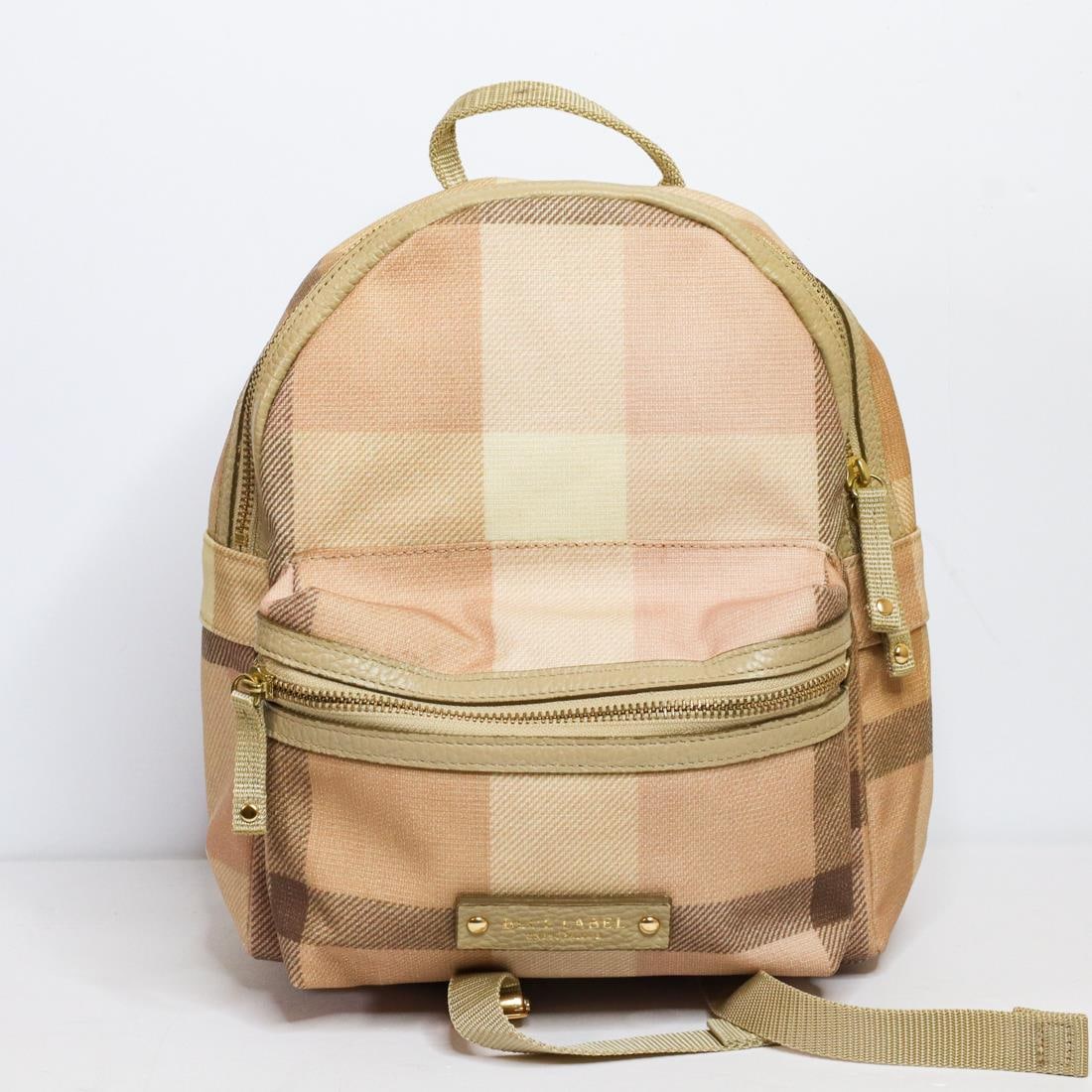 BURBERRY CRESTBRIDGE BLUE LABEL BACKPACK: Burberry Crestbridge Blue Label Backpack in good condition. It features adjustable straps, a handle, gold-toned hardware, an exterior zipper pocket, and a Blue Label Crestbridge plaque on the front. T