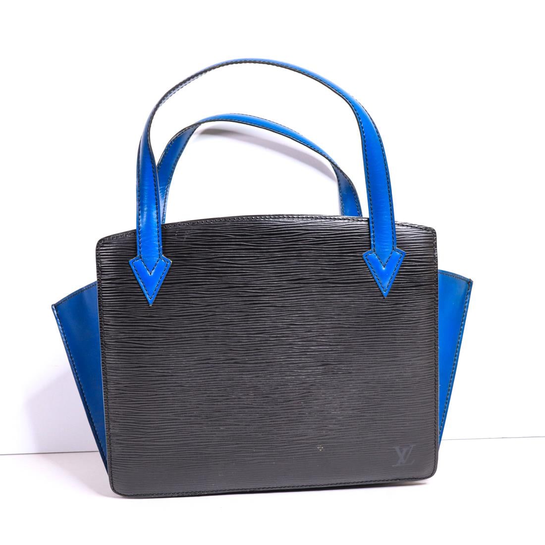 LOUIS VUITTON EPI VARENNES HANDBAG: Louis Vuitton Epi Varennes handbag. The inside is split into two compartments that are separated by a zipper pocket. There is a tear on the side of the bag and medium wear overall. Details and measure