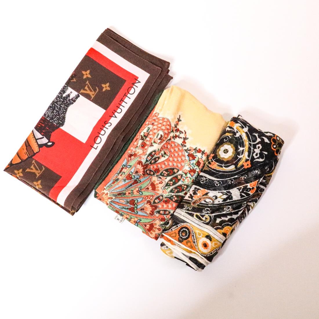 LOT OF 3 LOUIS VUITTON/T&CO./ETRO SILK SCARVES: Three silk scarves, One Louis Vuitton monogram scarf, one Tiffany & Co. floral scarf, and one Etro floral scarf. The scarves have some wear but are still in good condition. Details and measurements: L