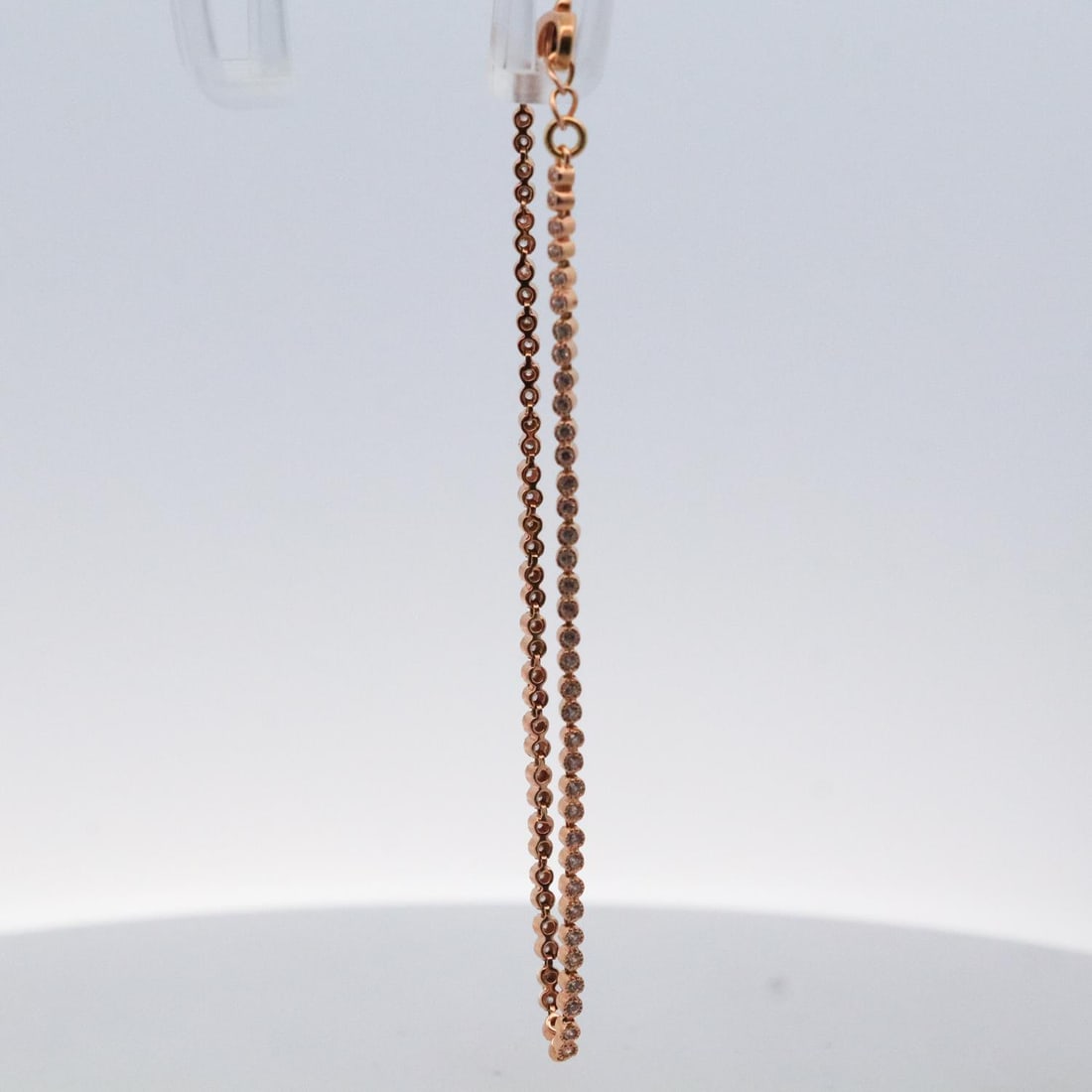14KRG DIAMOND TENNIS BRACELET: 14-karat yellow gold tennis bracelet featuring round brilliant diamonds. Stamped K14 on the bracelet's clasp. Details and measurements: Bracelet length: 7 IN. Weight: 3.8 G.