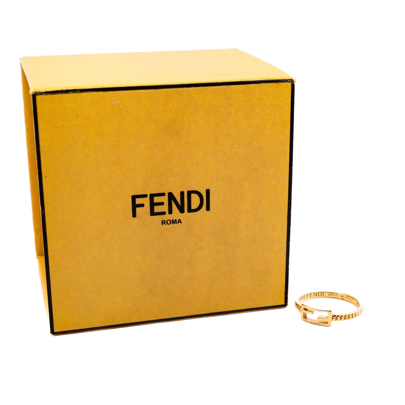 Fendi Mamma Ring Gold Plated with Box – Size US 7: Fendi gold-tone Mamma ring with signature FF logo motif. Italian craftsmanship with braided shank detail. Comes with original box. Size / Measurements US size 7 <