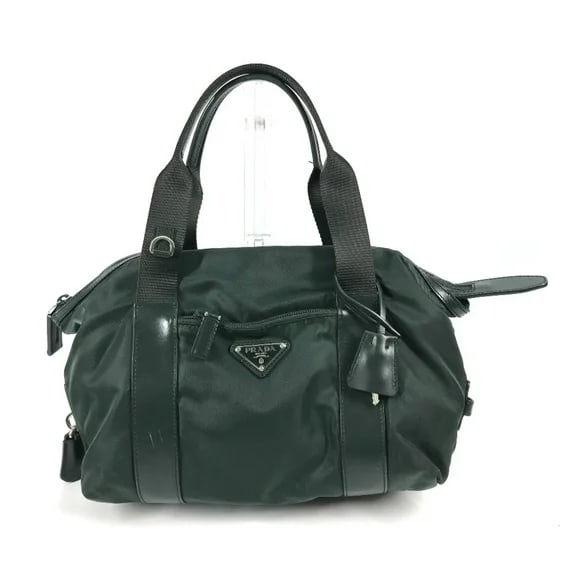 Prada Nylon and Leather Tote Bag 20% UP BR3697 Green – Structured Carryall: Prada BR3697 tote crafted from dark green nylon with leather trim and silver-tone hardware. Features top zip closure, front zip pocket with enamel logo triangle, dual rolled leather and web handles, a