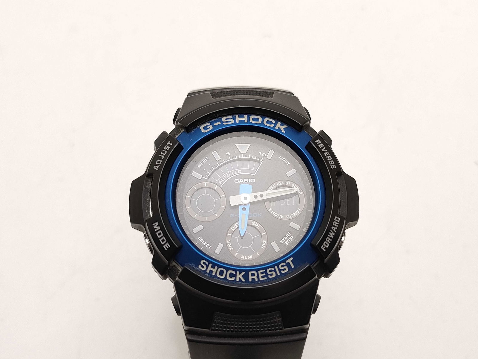Casio G-Shock AW-591 Black & Blue Analog-Digital Watch: Casio g-shock aw-591 men’s watch, authentic. black resin case with blue metallic bezel accent. combination analog-digital display featuring three sub-dials and luminous hands. labeled “g-shock&rdq