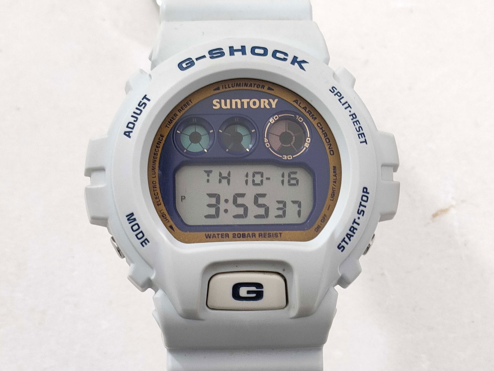 Casio G-Shock DW-6900FS “Suntory?? White Digital Watch: Casio g-shock dw-6900fs men’s watch, authentic. limited edition “suntory” model featuring white resin case and band. digital display with three indicator windows and “suntory” brandi