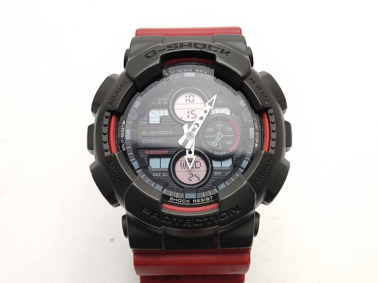 Casio G-Shock GA-140 Black & Red Resin Men’s Watch: Casio g-shock ga-140 men’s watch, authentic. rugged black resin case with contrasting red strap and stainless steel caseback. analog-digital dial featuring multi-function sub-displays for stopwatch,
