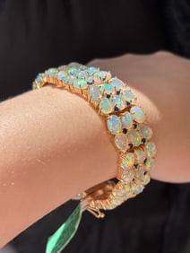 Important 18kt Yellow Gold 35ctw Ethiopian Orion Opal, Sapphire, and Diamond Bracelet 7"