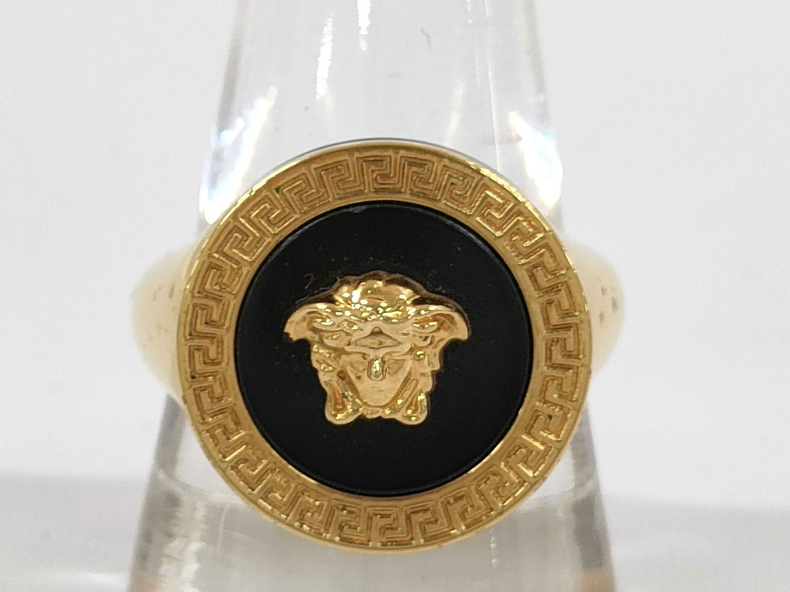 A New Jersey Man's Versace Signet Ring size 10.5: Found at the Bada-Bing in New Jersey some 20 years ago, from the estate of a man in the waste management business. Authentic Versace statement ring in a bold signet style. The top is a round black ena