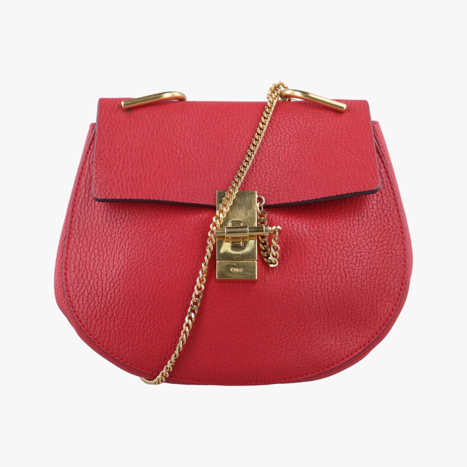 Chloé Drew Red Leather Shoulder Bag: Authentic Chloé Drew shoulder bag in rich red grained leather with a rounded silhouette and structured flap closure. Features gold-tone hardware, a signature bar-and-chain fastening, and matchi