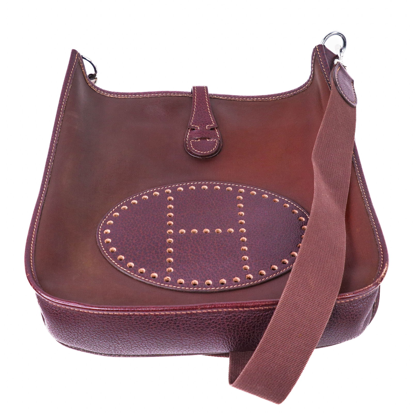 Hermes Evelyne I PM Amazone Leather Shoulder Bag Brown: Crafted in Amazone coated leather in brown. Classic Evelyne I PM design with perforated H logo at front. Adjustable fabric shoulder strap for crossbody wear. Top leather tab with snap closure. Comes w