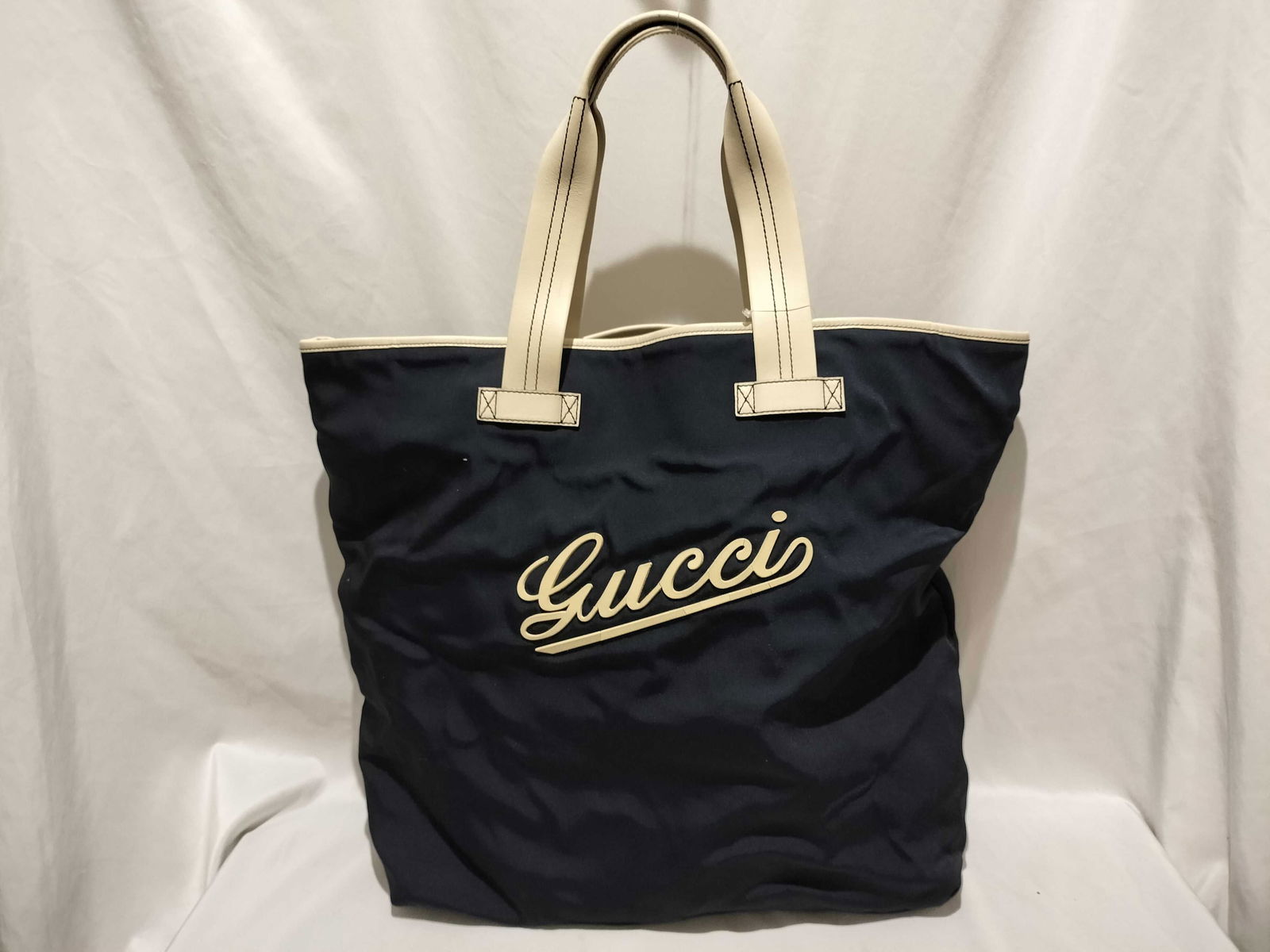 Gucci Script Nylon Tote: Authentic Gucci tote bag W44 x H37 X D18cm. somewhere between navy and black. 