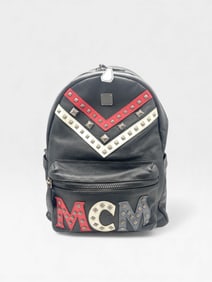 MCM Limited Edition Black leather backpack with red and white studded details