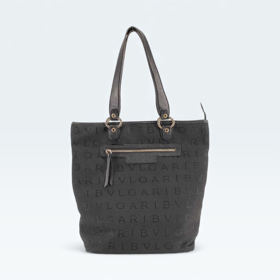 BVLGARI Logomania Canvas Tote Bag: Authentic Bulgari canvas and leather logomania shopper tote bag with gold tone hardware and black leather trim. Bvlgari branding thru out.