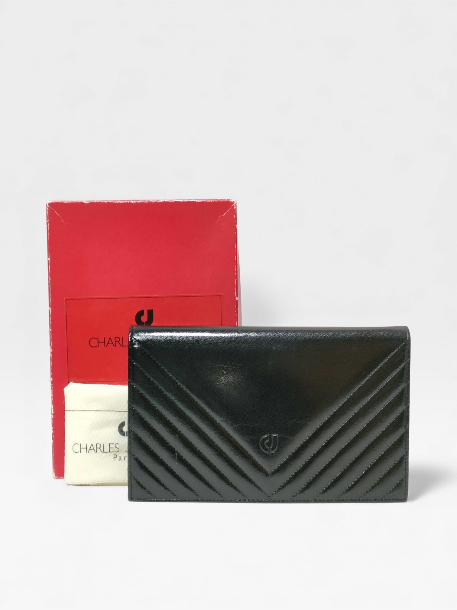 Vintage Charles Jourdan black leather clutch bag. (1 of 10)