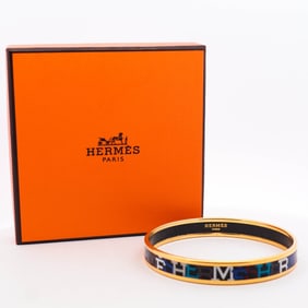 Hermès enamel printed Capitales bangle in blue and gold with box