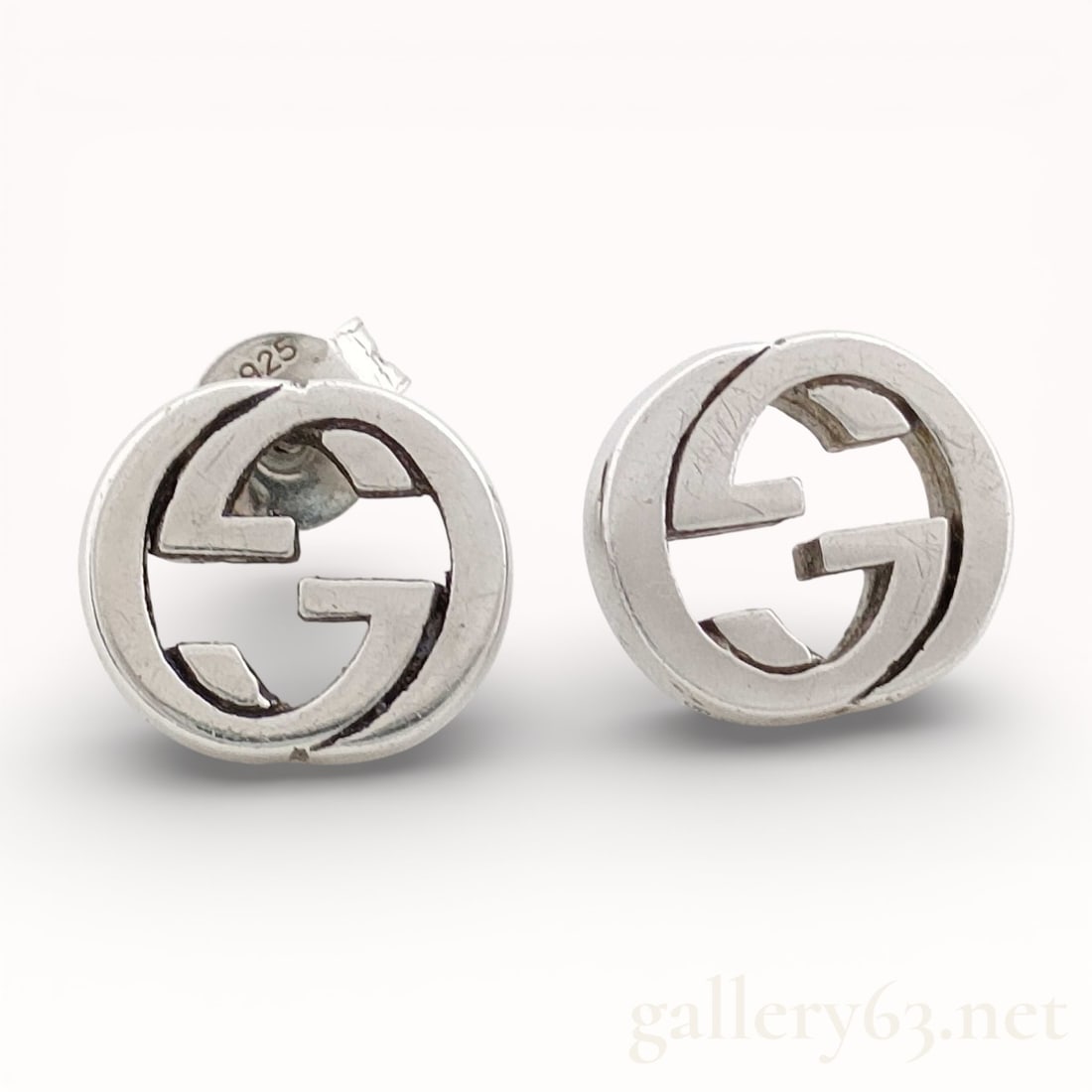 Gucci GG Monogram Sterling Silver Stud Earrings: Authentic Gucci GG monogram sterling silver stud earrings with sterling silver backs. 