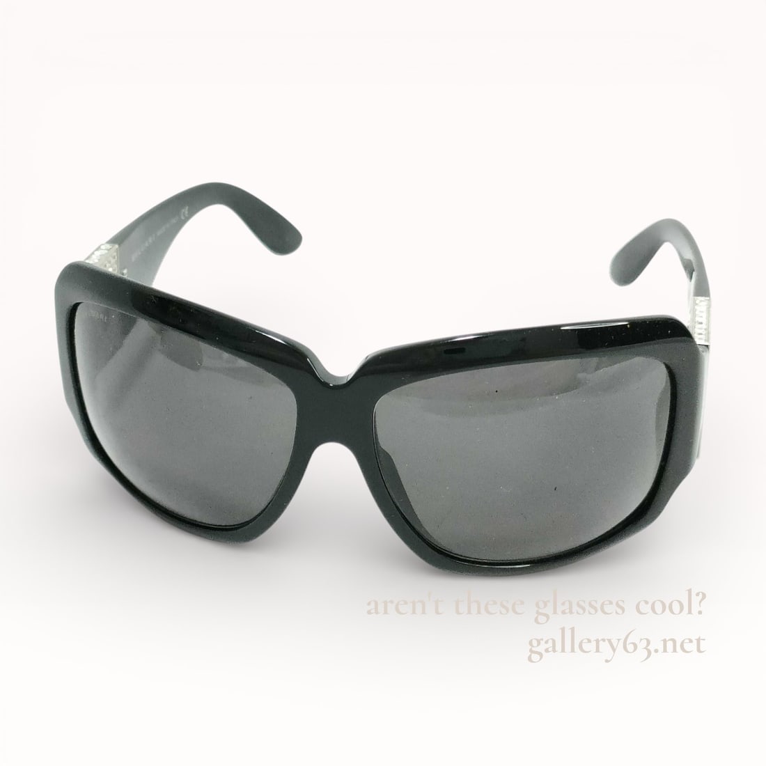 BVLGARI Black Acetate Rhine Stone Palladium Over Size Sunglasses: Bulgari black acetate with palladium tone rhinestone temple BVLGARI oversized sunglasses. 8018-b sunglasses made in Italy. 