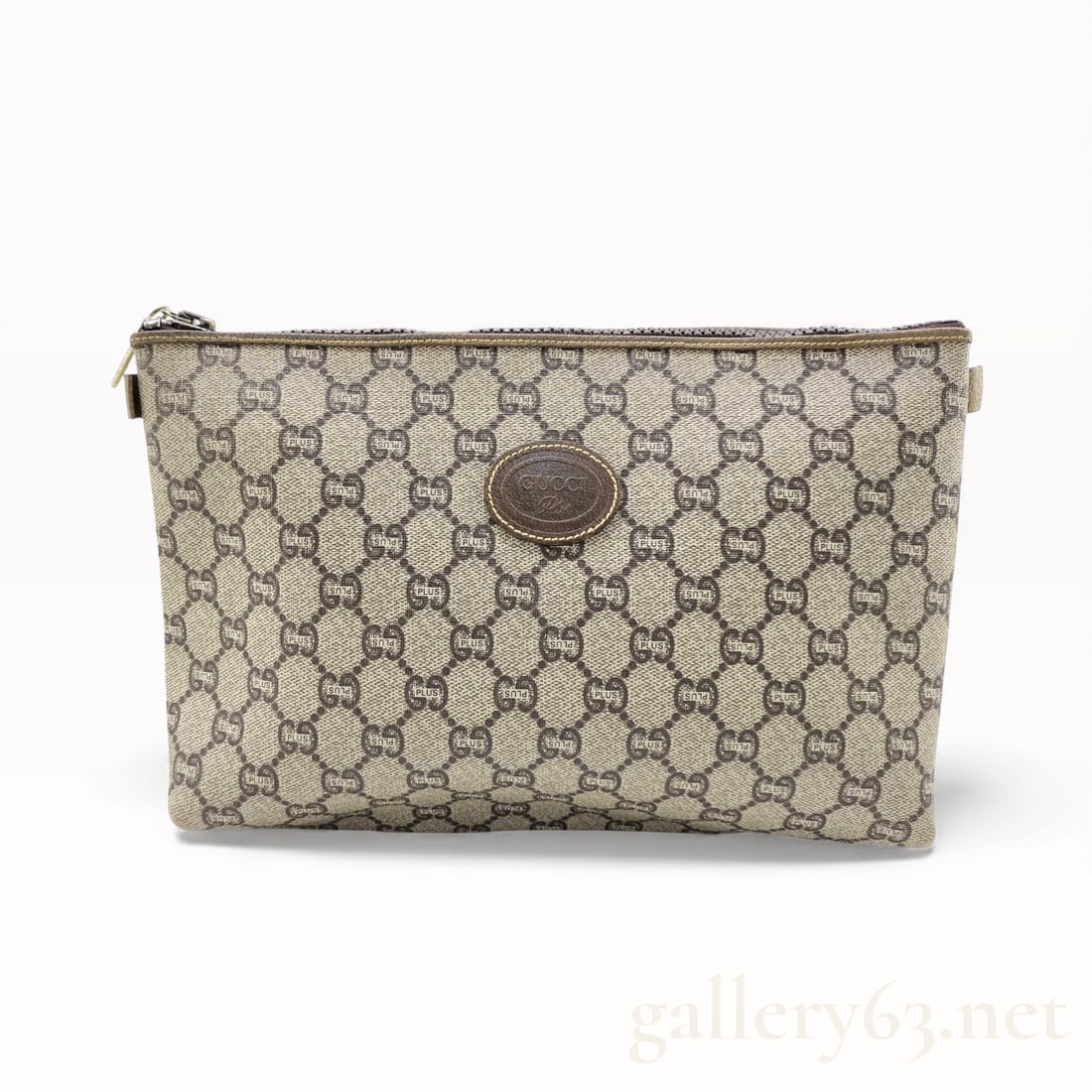 Vintage Gucci GG Plus Monogram Canvas Pouch: Authentic Vintage Gucci GG Plus Monogram Canvas Pouch . It is 1987 and you are in Miami, you're going out for the night and need a small bag to carry with you. This could have been that bag, but it wa