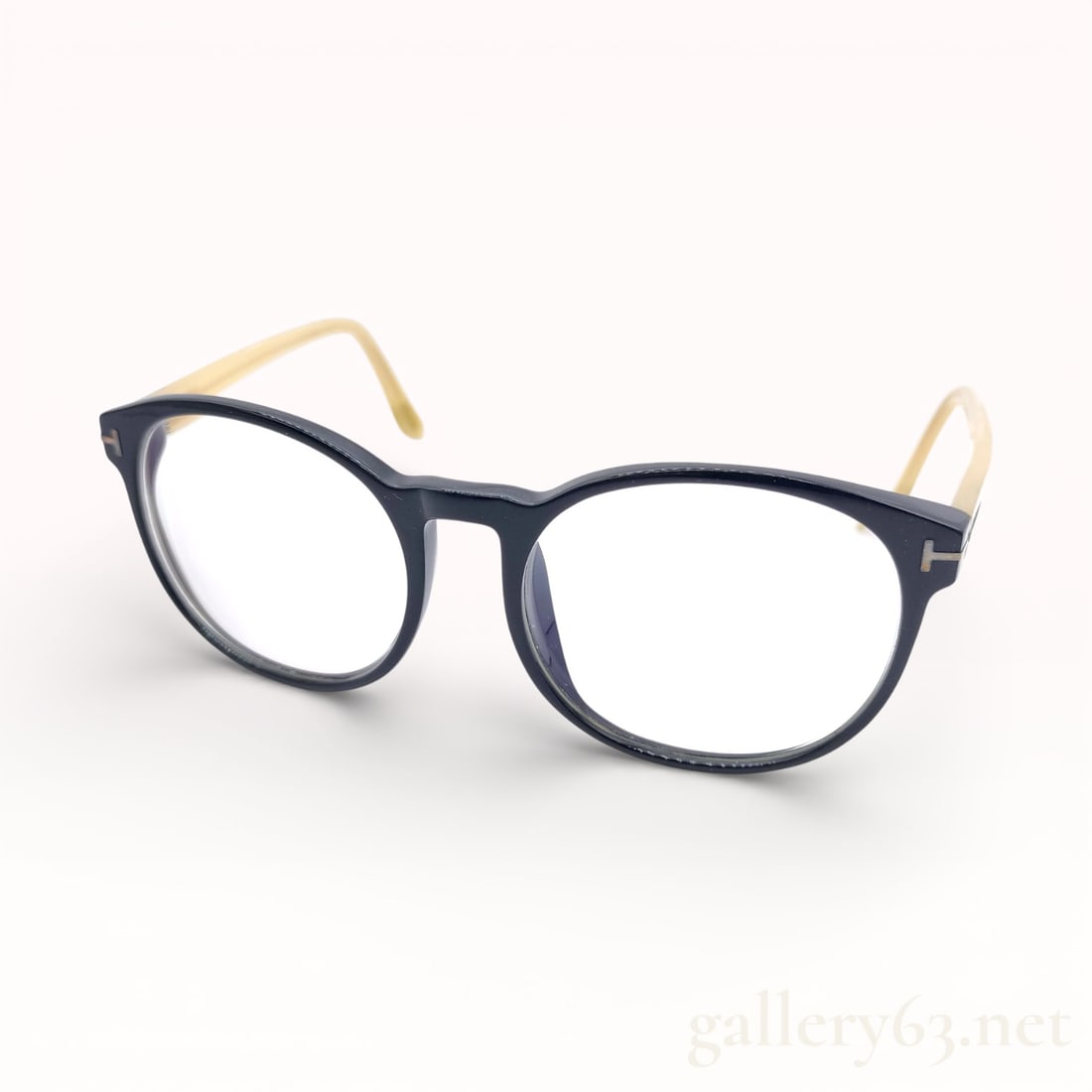 Tom Ford TF 2-16 Eyeglasses Frame Black With Light Temples, box & case: Authentic Tom Ford eyeglasses frame featuring a black plastic front with rounded rectangular lens openings. Temples finished in a contrasting light tone, displaying the signature Tom Ford metal “T&r