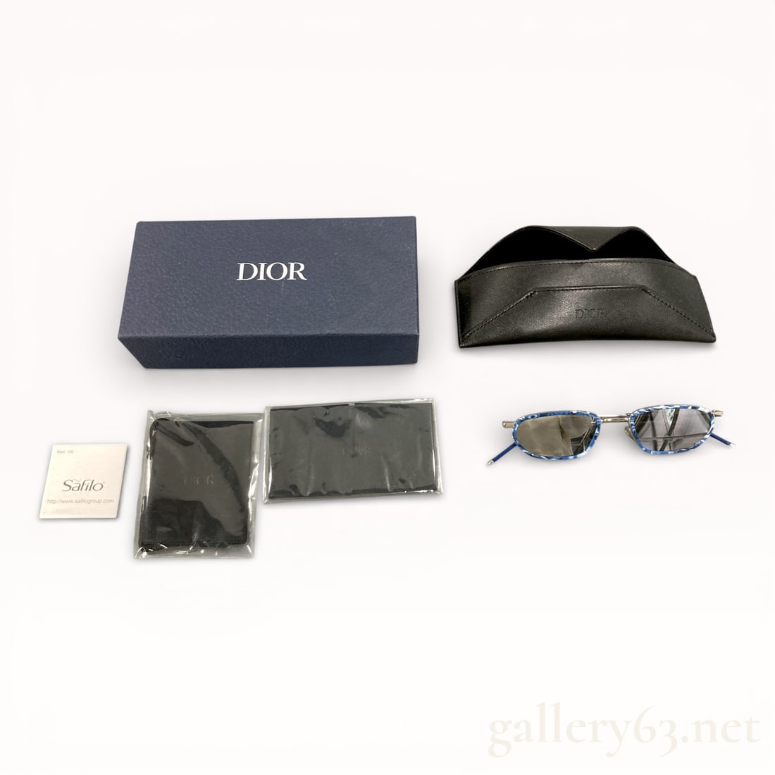 Dior DiorShock Brand New Sunglasses Blue & White with Box & Everything Retail $500 right now: Authentic pair of Dior Shock sunglasses featuring a blue and white marble-effect acetate frame and silver-tone hardware. Dior model 006. Dior sunglasses featuring a rectangular frame with a tra