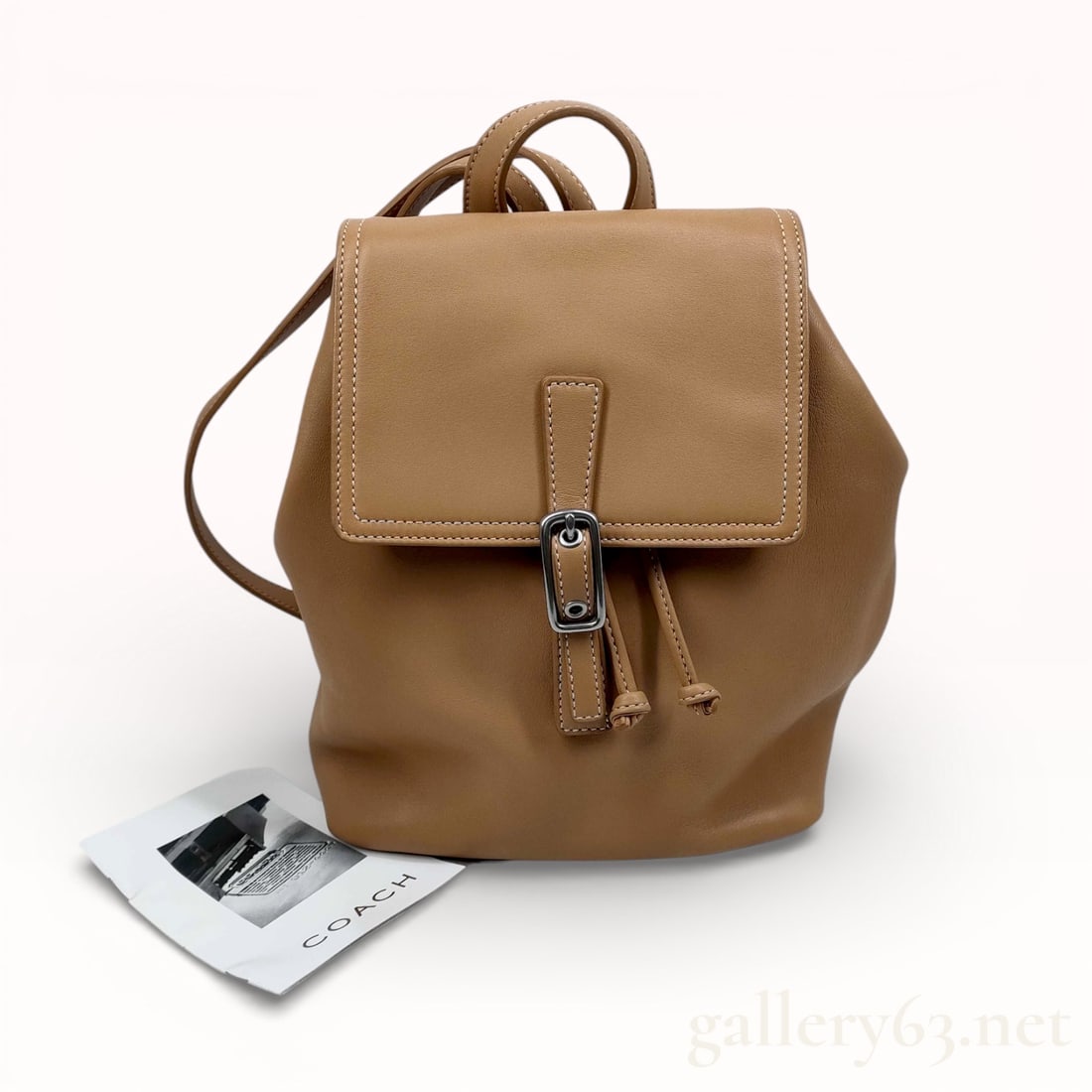 Vintage Tanned Leather Coach Rucksack: Authentic vintage Coach Legacy (or Hamptons) model 9858 backpack in camel tan glovetanned leather. Vintage Coach rucksack backpack having tanned leather exterior and soft structured silhouette. Backpa