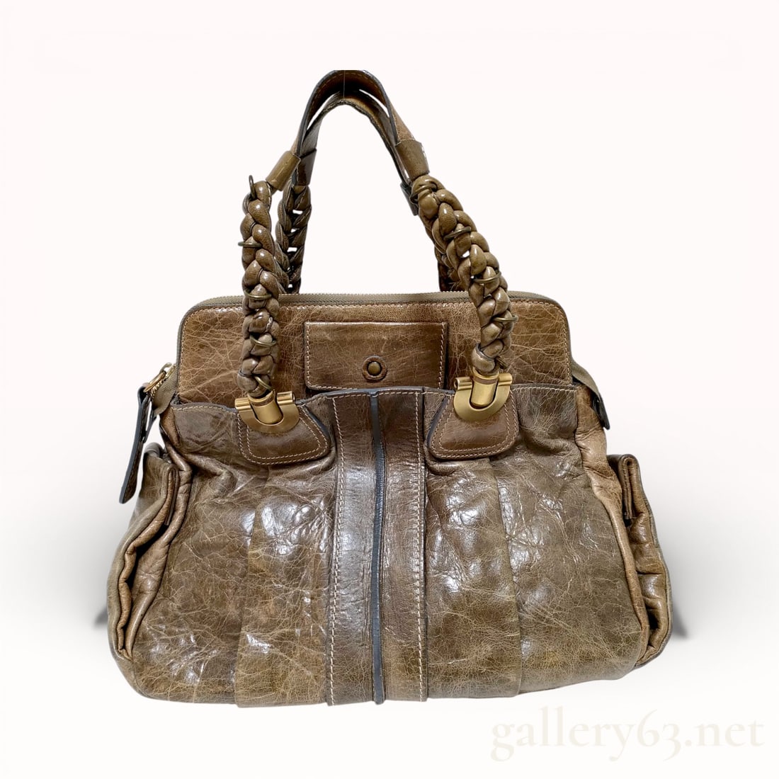 Chloe Heloise Brown Leather Handbag: Authentic Chloe Héloise leather handbag in a distressed brown color with braided handles.