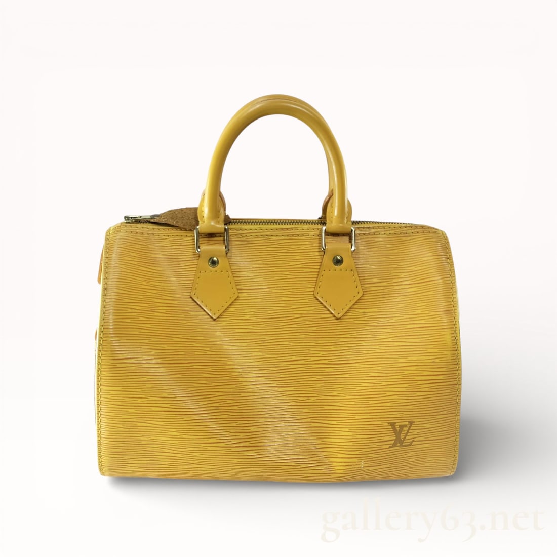 Louis Vuitton Epi Speedy 30 Handbag: Authentic Louis Vuitton Speedy 30 handbag crafted in yellow Epi leather featuring a textured linear grain throughout. Structured top-handle silhouette having rolled leather handles secured with leathe