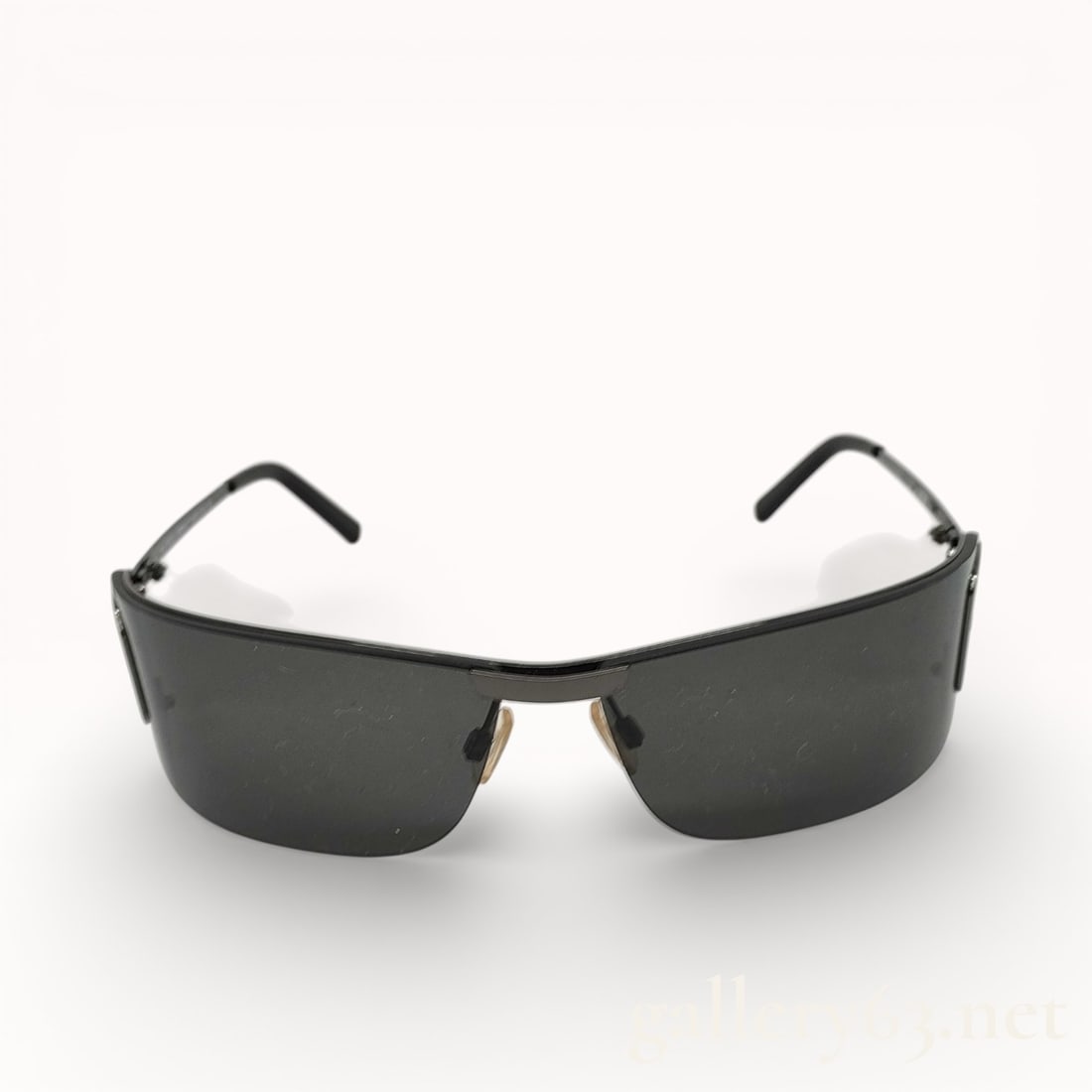 Dolce & Gabbana Shield Sunglasses: Authentic Dolce & Gabbana sunglasses having a wraparound shield-style design. Black frame set with a single continuous dark tinted lens. Slim temples featuring signature Dolce & Gabbana logo d